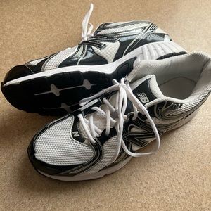 NEW BALANCE MEN’S size 13! 4E XWIDE T. LARGE. White and black.